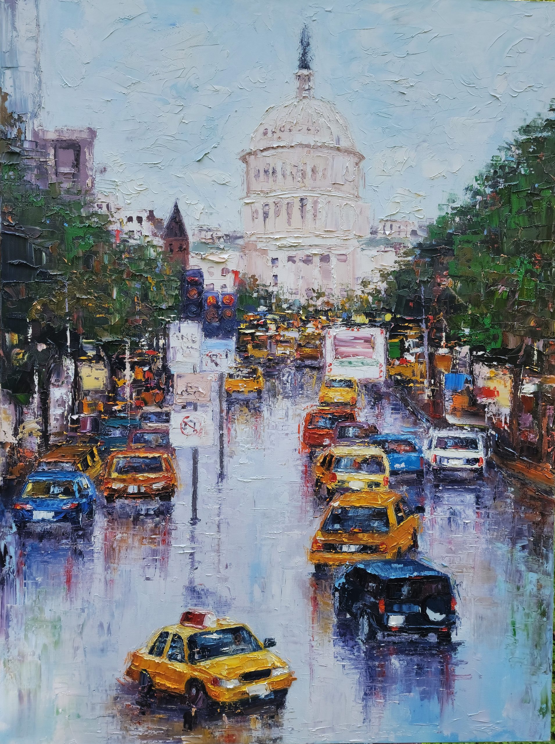 Road-to-Power-scaled.jpg Thickly painted cityscape with colorful taxi cabs on a rain-slicked avenue leading towards a domed capitol building.