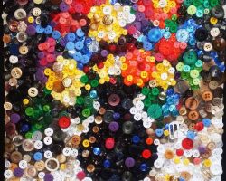 A picture of a flower made of buttons by a DC artist.