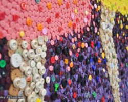 A piece of mosaic art made from buttons for a school in Washington DC.